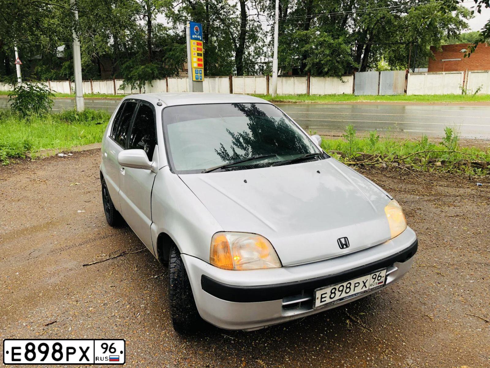 Фото автомобиля HONDA LOGO, 1997 — госномер Е415РА702