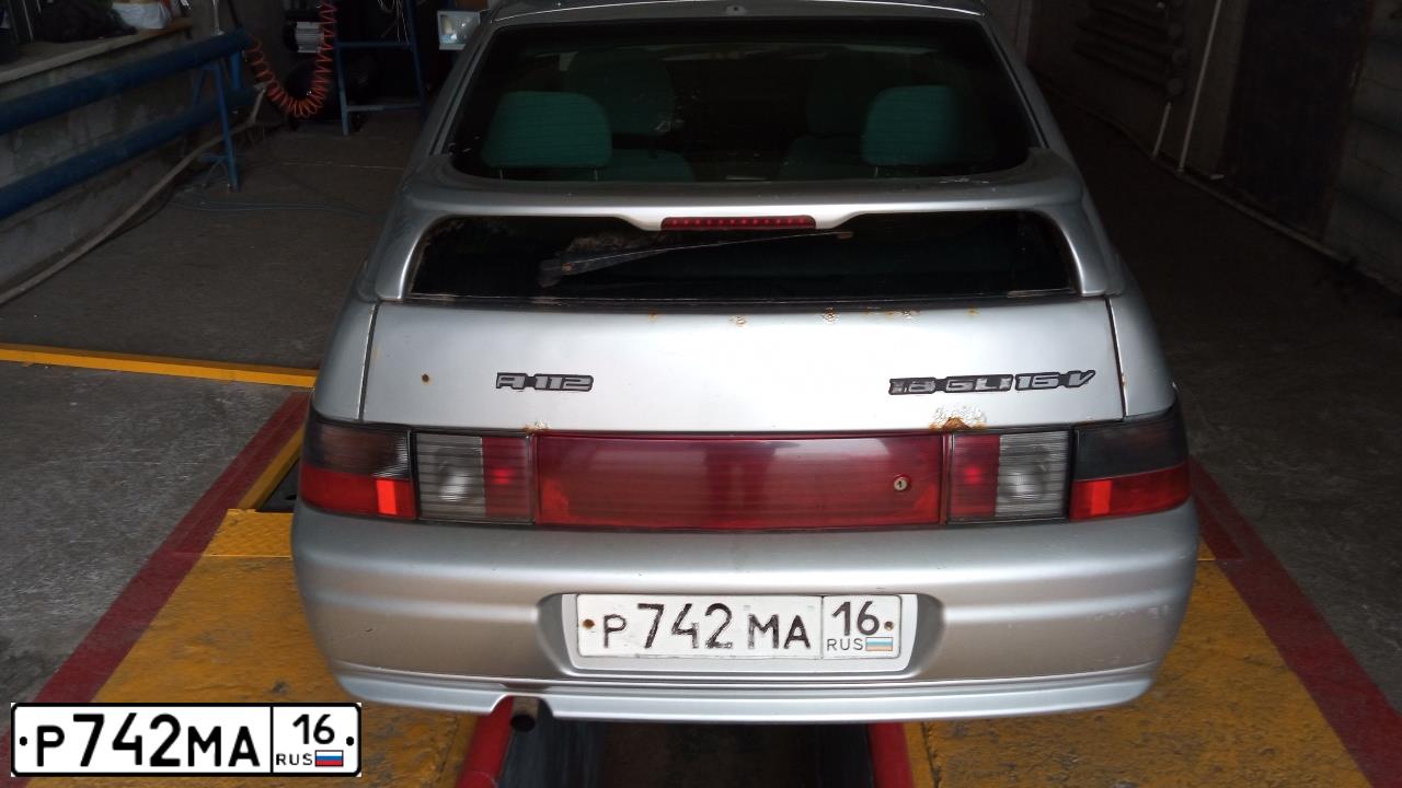 Фото автомобиля LADA 2112, 2006 — госномер М163ХА774. Цвет: СВЕТЛО-СЕРЕБРИСТЫЙ МЕТАЛЛ