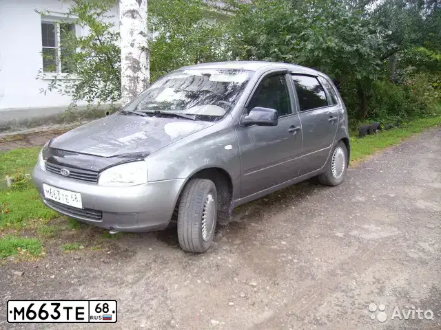 Фото автомобиля LADA KALINA, 2007 — госномер М095КУ136. Цвет: Темно-серый металлик