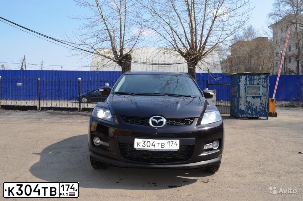 Фото автомобиля MAZDA CX-7, 2008 — госномер Е353МК174. Цвет: ТЕМНО-ВИШНЕВЫЙ