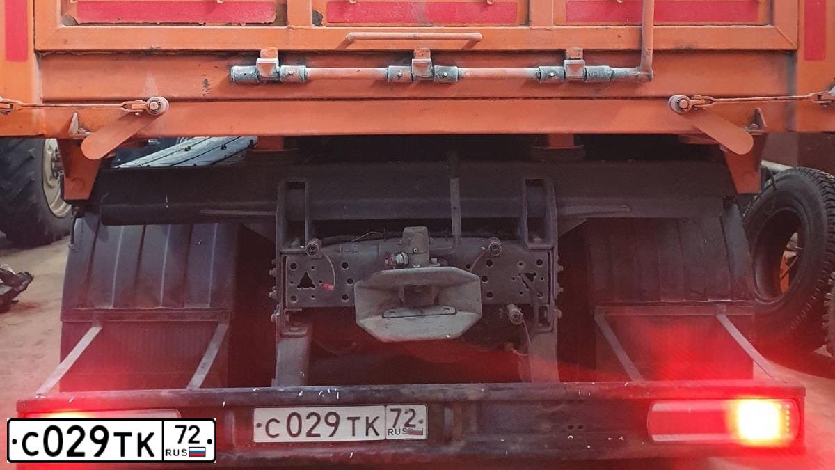 Фото автомобиля KAMAZ 65115 /6X4/, 2018 — госномер С029ТК72. Цвет: Оранжевый