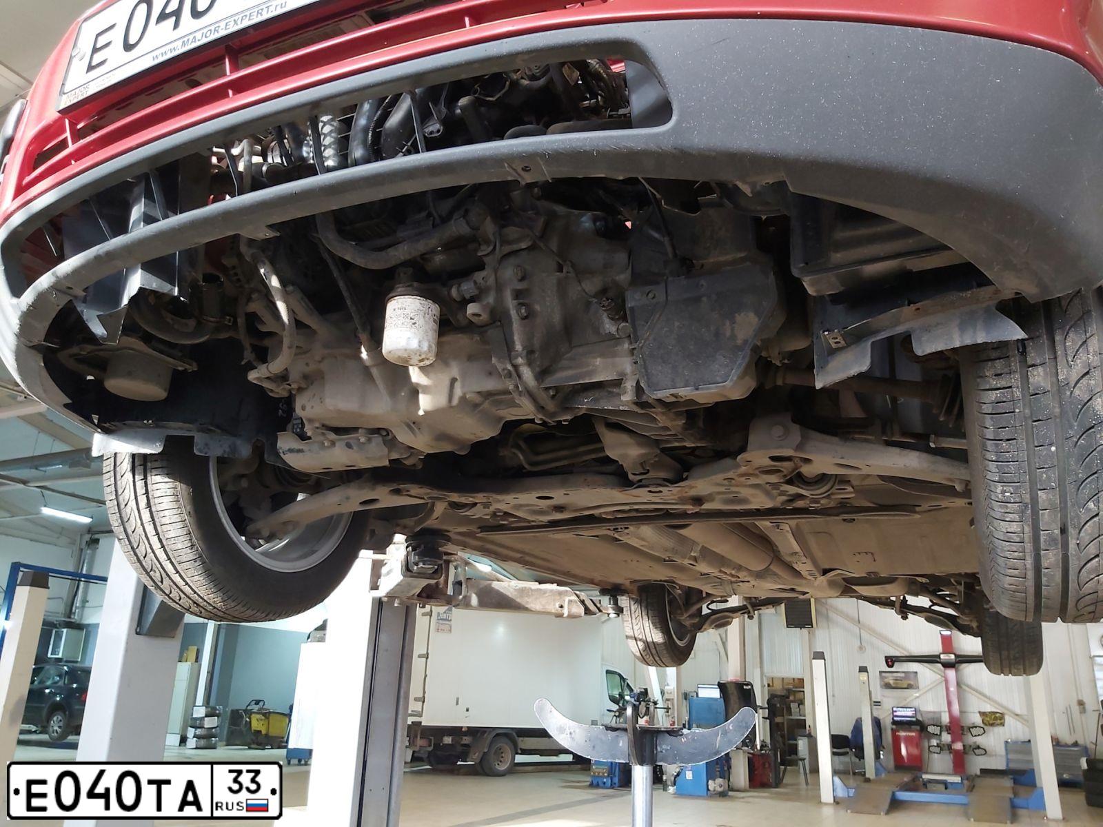 Фото автомобиля FORD FOCUS, 2007 — госномер Е040ТА33. Цвет: Красно-оранжевый