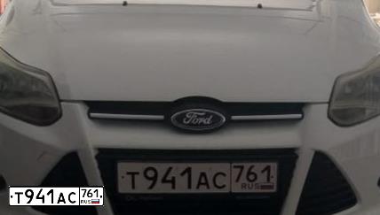 Фото автомобиля FORD FOCUS, 2012 — госномер Т941АС761. Цвет: Белый