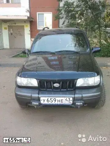 Фото автомобиля KIA SPORTAGE, 2005 — госномер Т111АВ177. Цвет: ЧЕРНЫЙ