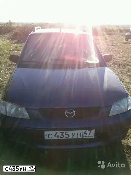Фото автомобиля MAZDA DEMIO, 2002 — госномер К688ТВ134. Цвет: синий