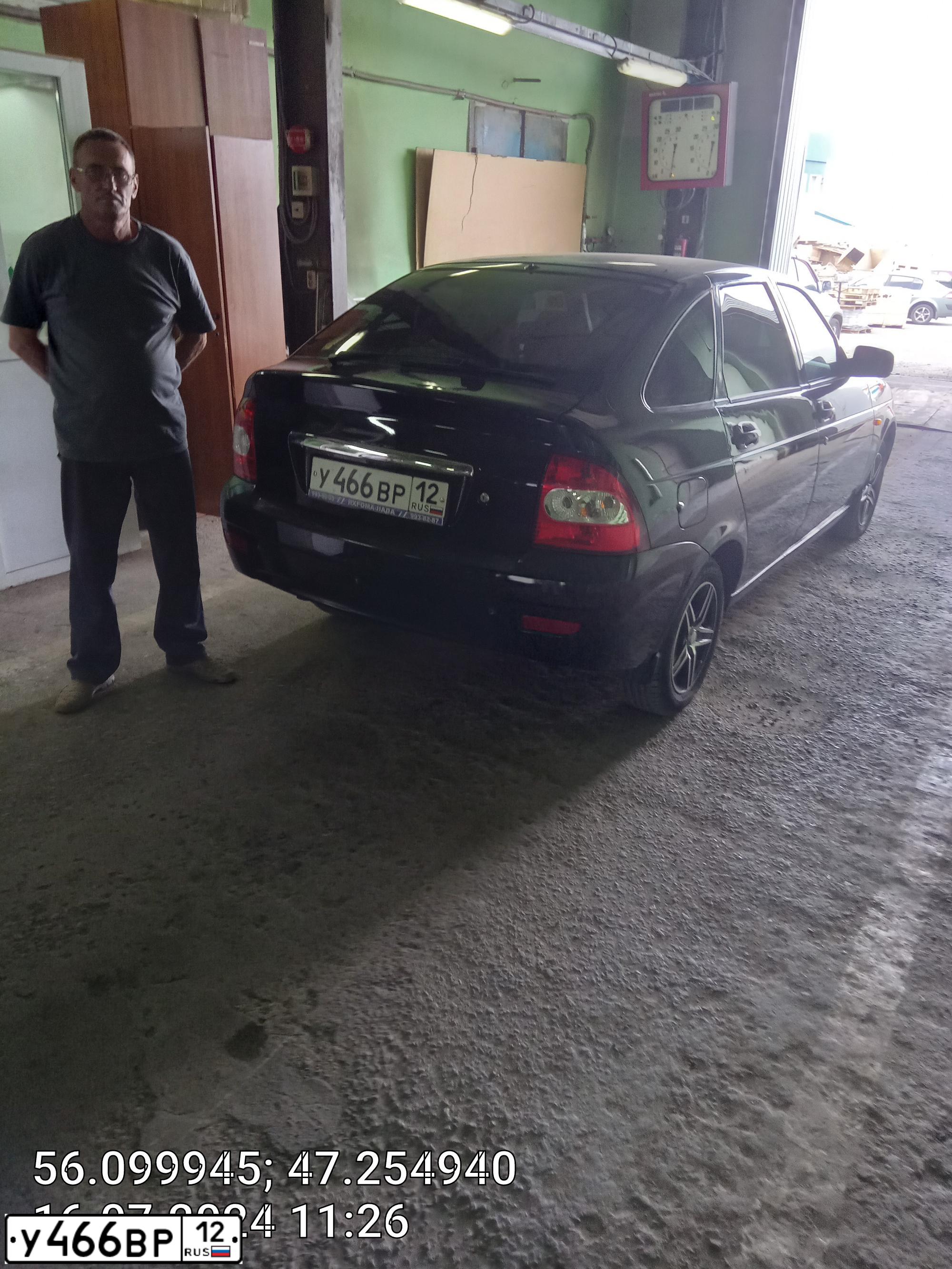 Фото автомобиля LADA PRIORA, 2010 — госномер М869ХТ21. Цвет: Сине-Черный