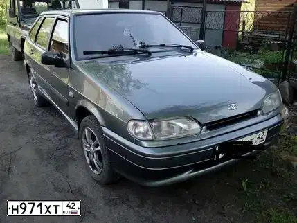 Фото автомобиля LADA 2114 SAMARA, 2010 — госномер Н971ХТ42. Цвет: средний серо-зеленый металлик