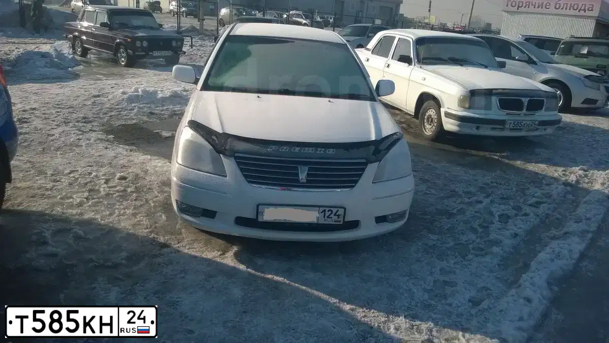 Фото автомобиля GAZ 3110 WOLGA, 2000 — госномер Т585КН24. Цвет: Белый