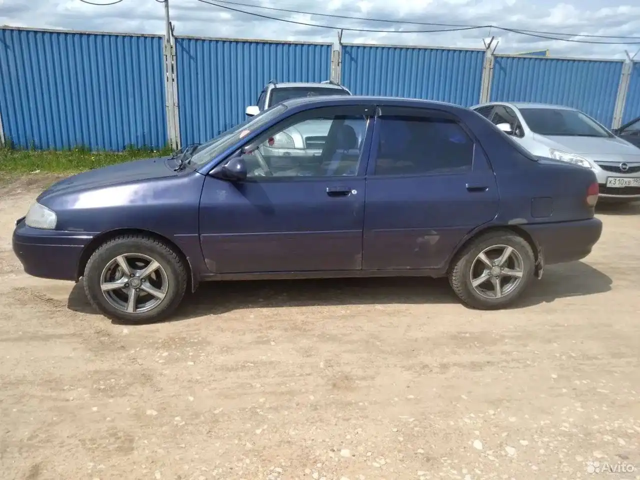 Фото автомобиля OPEL ASTRA, 2010 — госномер К310ХВ190. Цвет: СЕРЫЙ