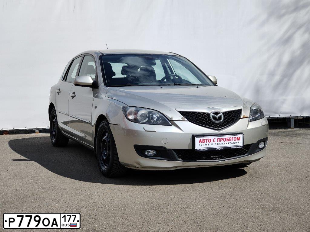 Фото автомобиля MAZDA 3, 2006 — госномер М427ТТ134. Цвет: ЗОЛОТИСТЫЙ
