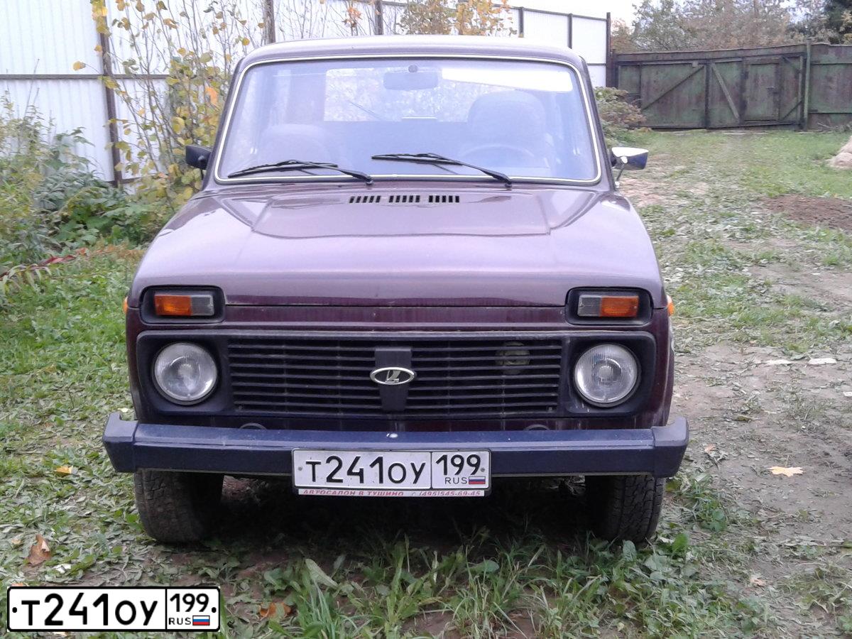 Фото автомобиля LADA 2121 NIVA, 2008 — госномер Т241ОУ199. Цвет: ТЕМНО-ВИШНЕВЫЙ