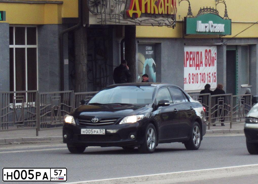 Фото автомобиля TOYOTA COROLLA, 2012 — госномер В560СВ57. Цвет: ЧЕРНЫЙ
