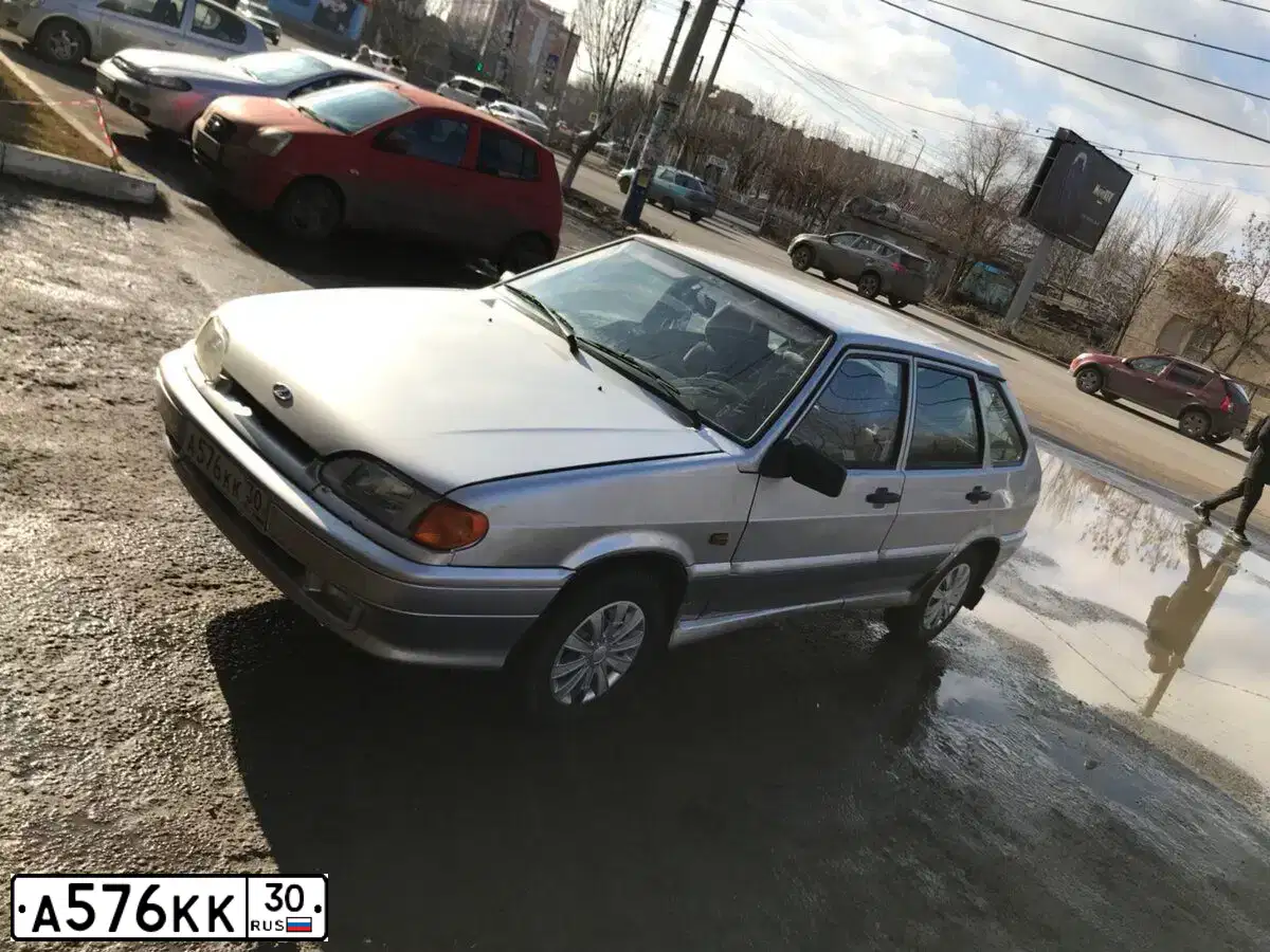 Фото автомобиля LADA 2114, 2006 — госномер Н198ОО30. Цвет: Светло-Серебристый металлик