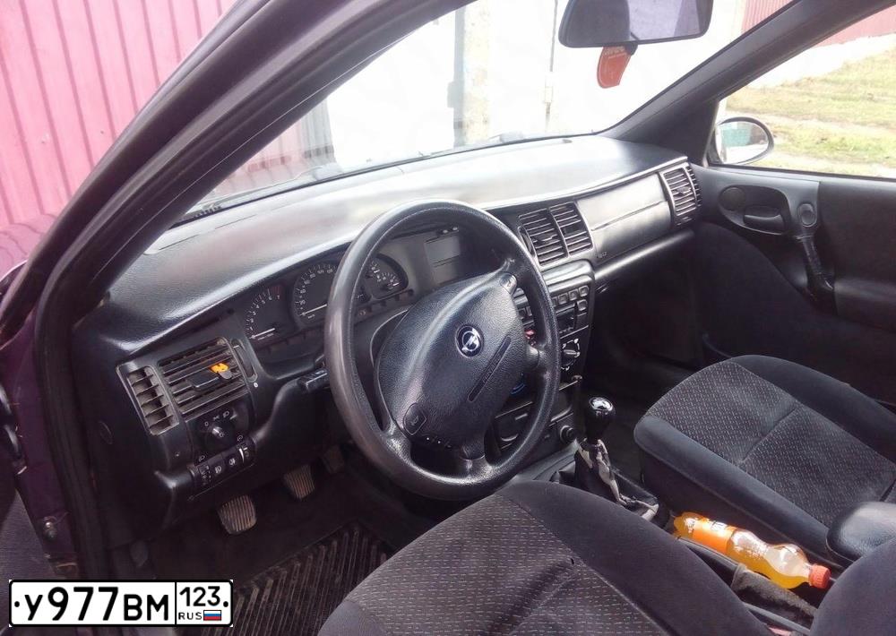 Фото автомобиля OPEL VECTRA, 1996 — госномер Е489УК82. Цвет: ФИОЛЕТОВЫЙ