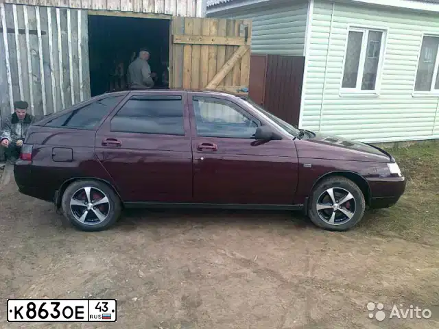 Фото автомобиля LADA 2112 LADA, 2007 — госномер Р353РМ11. Цвет: ТЕМНО-ВИШНЕВЫЙ