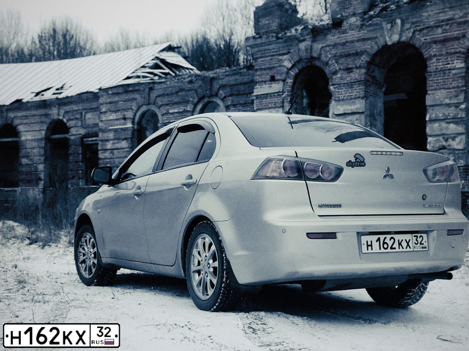 Фото автомобиля MITSUBISHI LANCER, 2011 — госномер У419РН197. Цвет: БЕЖЕВЫЙ