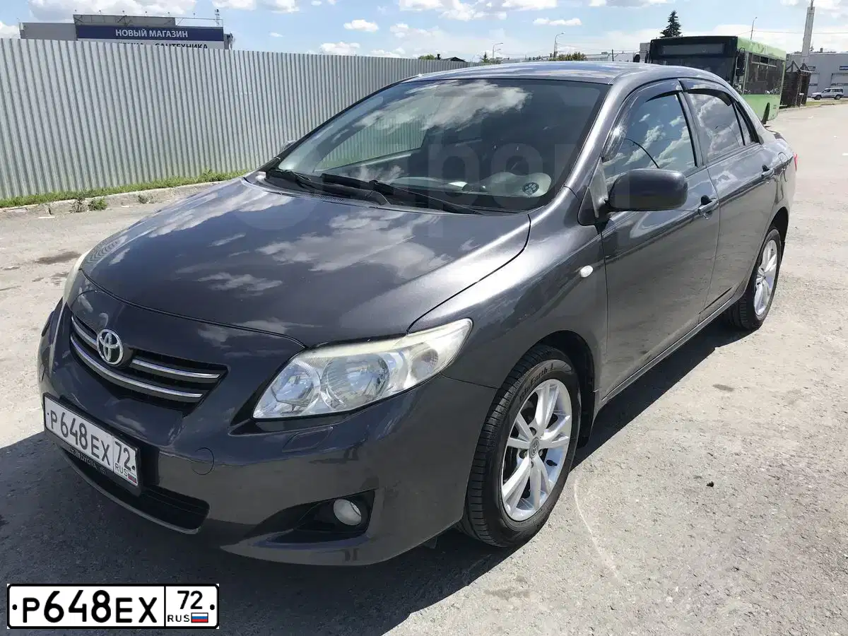 Фото автомобиля TOYOTA COROLLA, 2008 — госномер Х800ТС72. Цвет: СЕРЫЙ