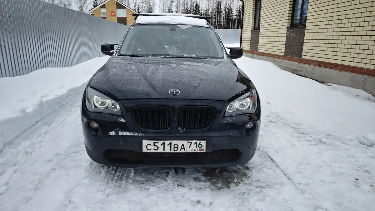 Фото автомобиля BMW X1, 2011 — госномер С511ВА716. Цвет: ЧЕРНЫЙ