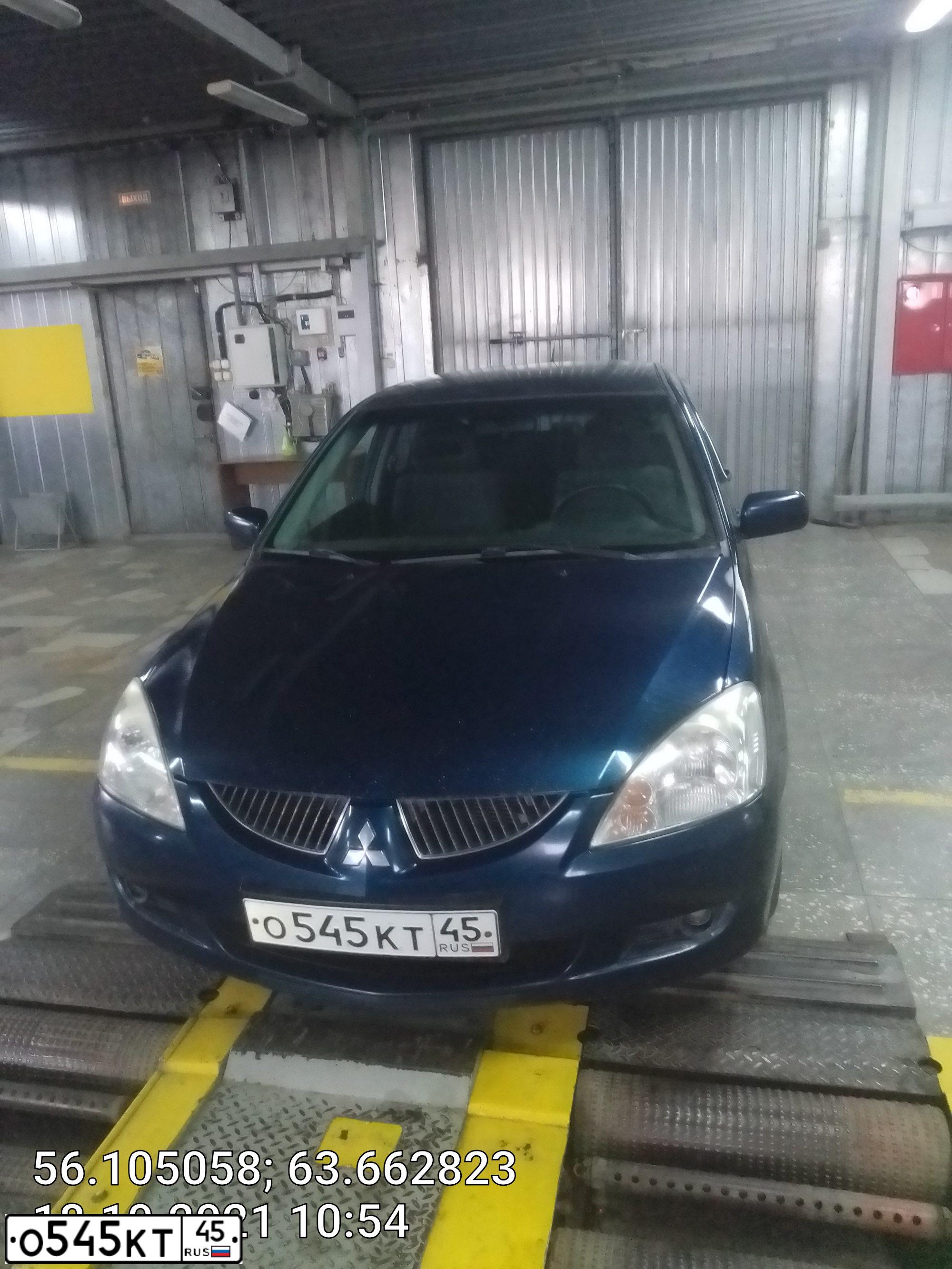 Фото автомобиля MITSUBISHI LANCER, 2005 — госномер Н586МН45. Цвет: синий