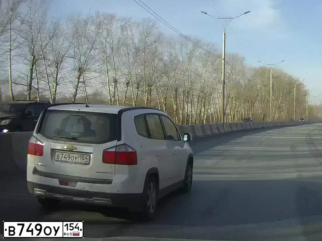 Фото автомобиля CHEVROLET ORLANDO, 2012 — госномер В749ОУ154. Цвет: БЕЛЫЙ