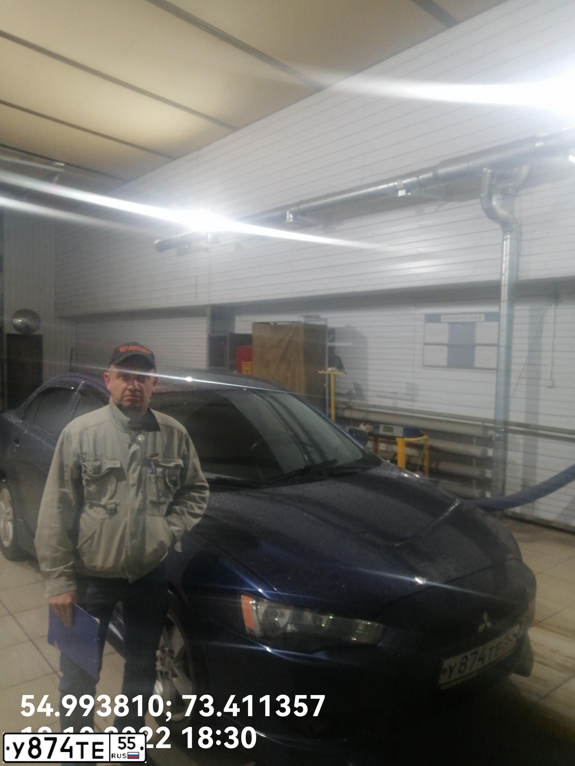 Фото автомобиля MITSUBISHI LANCER, 2008 — госномер У874ТЕ55. Цвет: синий