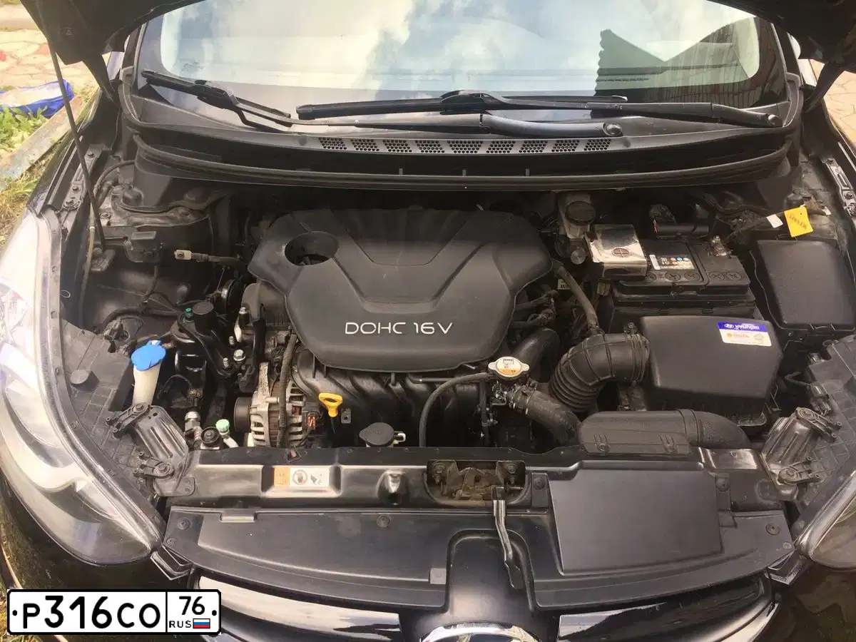 Фото автомобиля HYUNDAI ELANTRA, 2012 — госномер Н724АР76. Цвет: ЧЕРНЫЙ