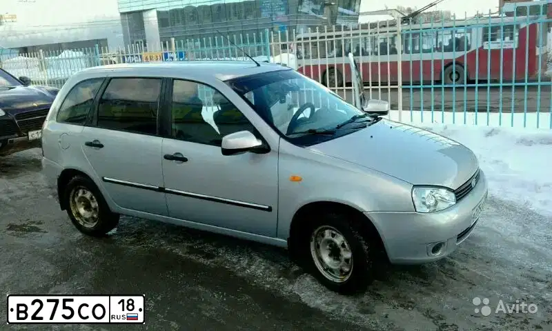 Фото автомобиля LADA 1117 KALINA, 2011 — госномер Е113СВ95. Цвет: Серебристый