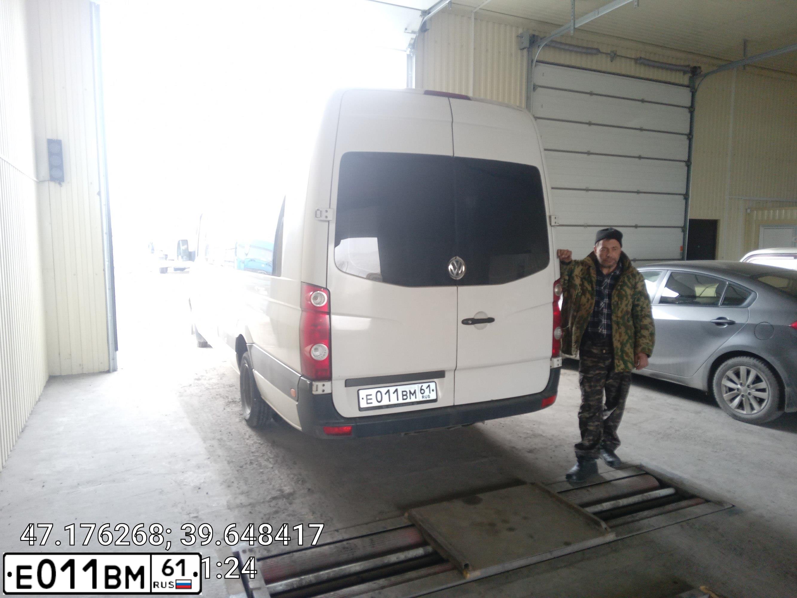 Фото автомобиля MITSUBISHI LANCER, 2008 — госномер Е011ВМ61. Цвет: Белый