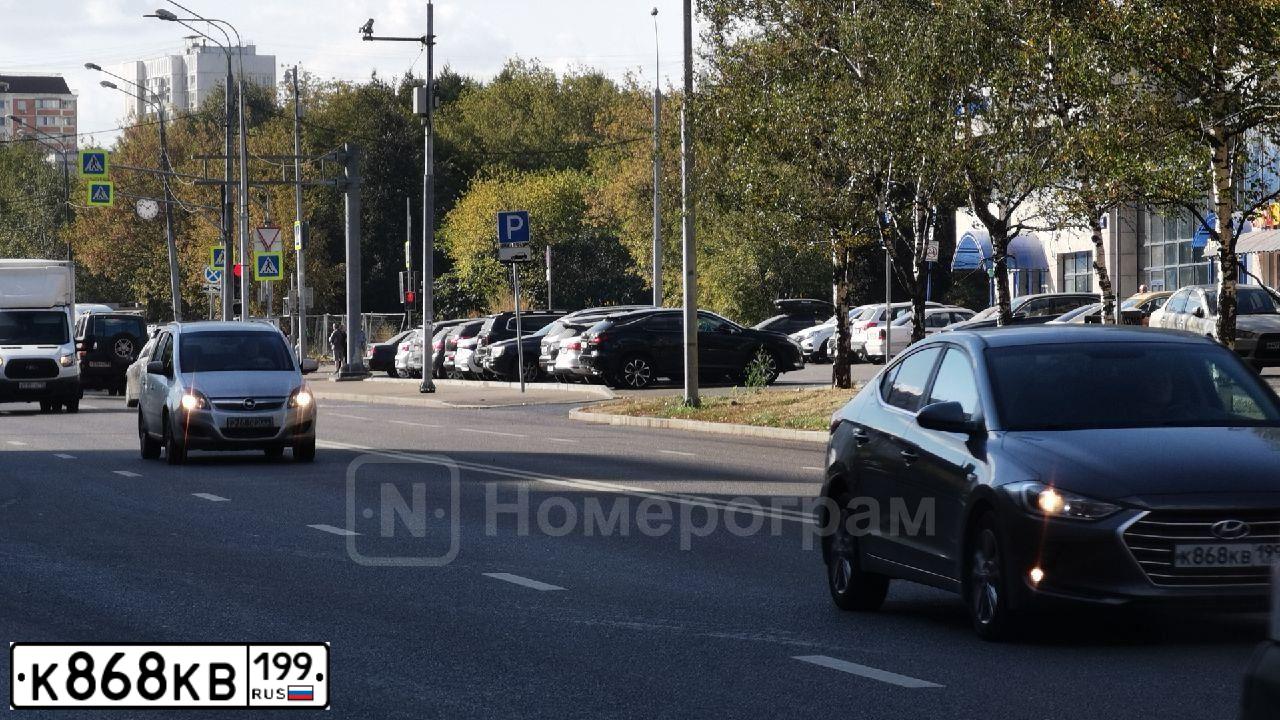 Фото автомобиля OPEL ASTRA, 2008 — госномер К868КВ199. Цвет: КРАСНЫЙ