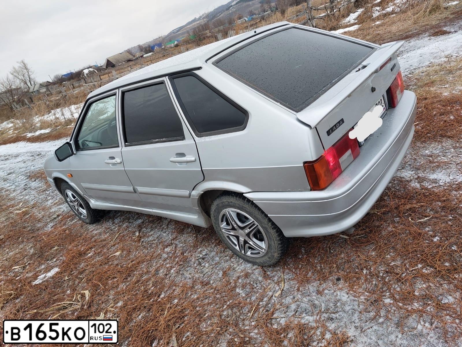 Фото автомобиля LADA 2114 SAMARA, 2010 — госномер Е713ТУ702. Цвет: СВЕТЛО-СЕРЕБРИСТЫЙ МЕТАЛЛ