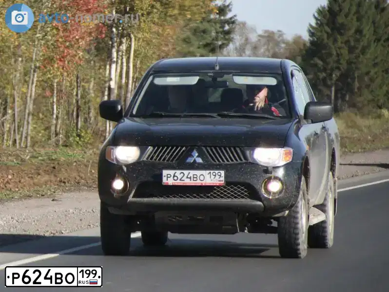 Фото автомобиля MITSUBISHI L 200, 2008 — госномер О540ВО57. Цвет: ЧЕРНЫЙ