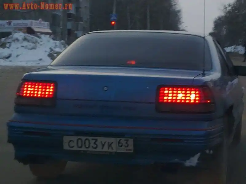 Фото автомобиля PONTIAC GRAND PRIX, 1992 — госномер С003УК63. Цвет: голубой