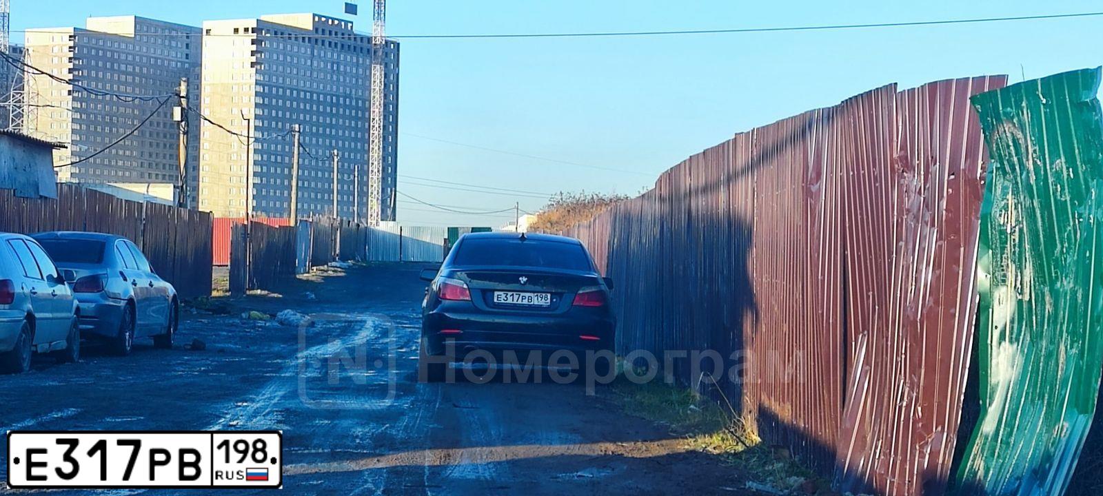 Фото автомобиля BMW SERIE 5, 2009 — госномер Е317РВ198. Цвет: ЧЕРНЫЙ