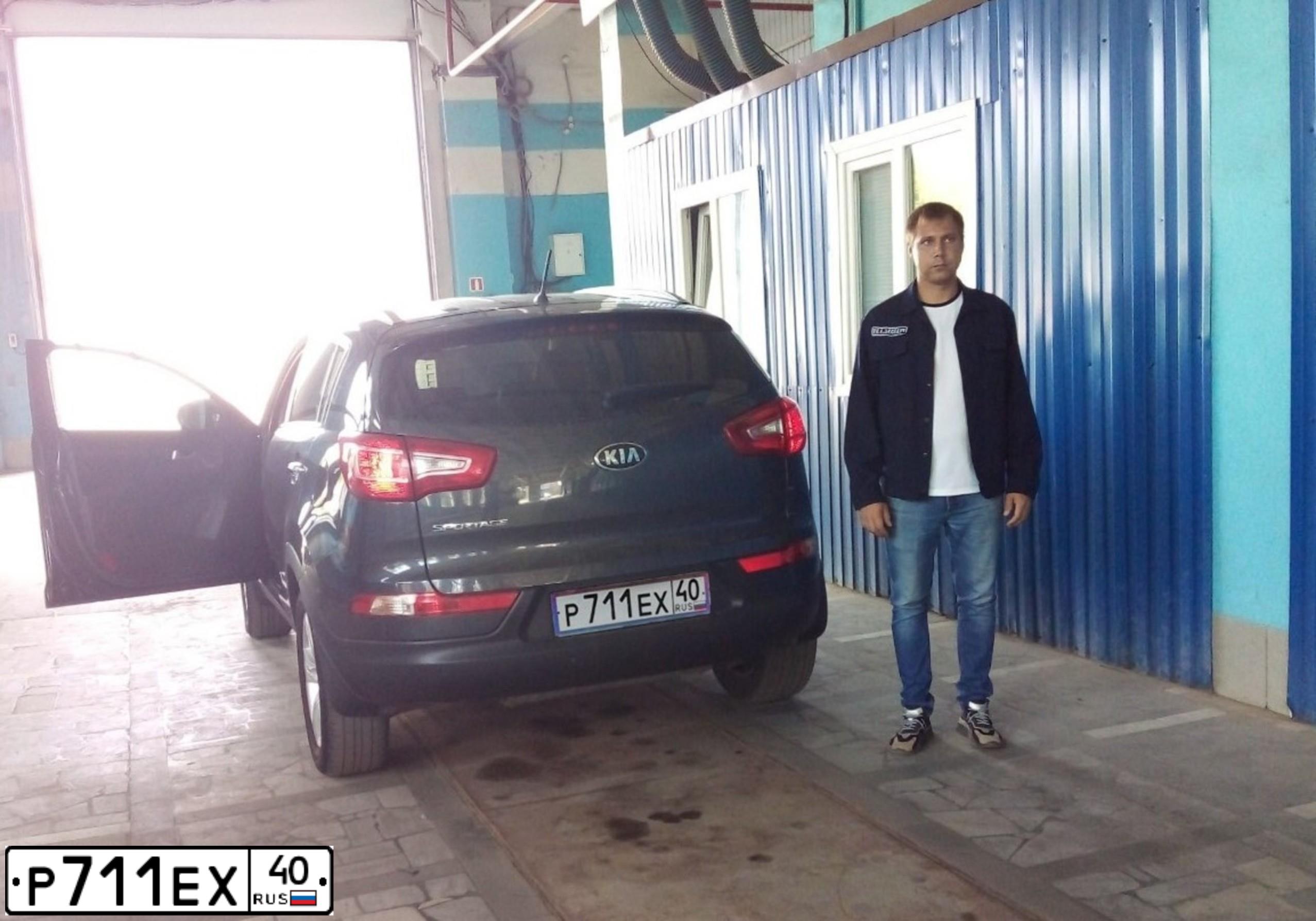 Фото автомобиля KIA SPORTAGE, 2012 — госномер Р711ЕХ40. Цвет: ЧЕРНЫЙ ПЕРЛАМУТ