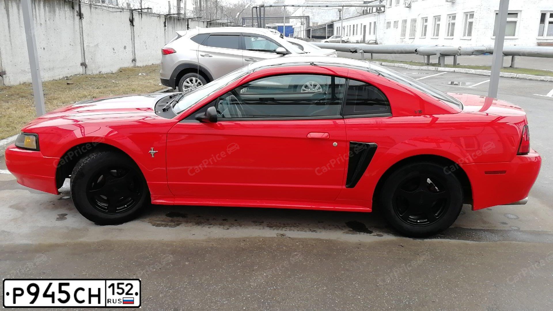 Фото автомобиля FORD MUSTANG, 2003 — госномер Р945СН152. Цвет: Красный