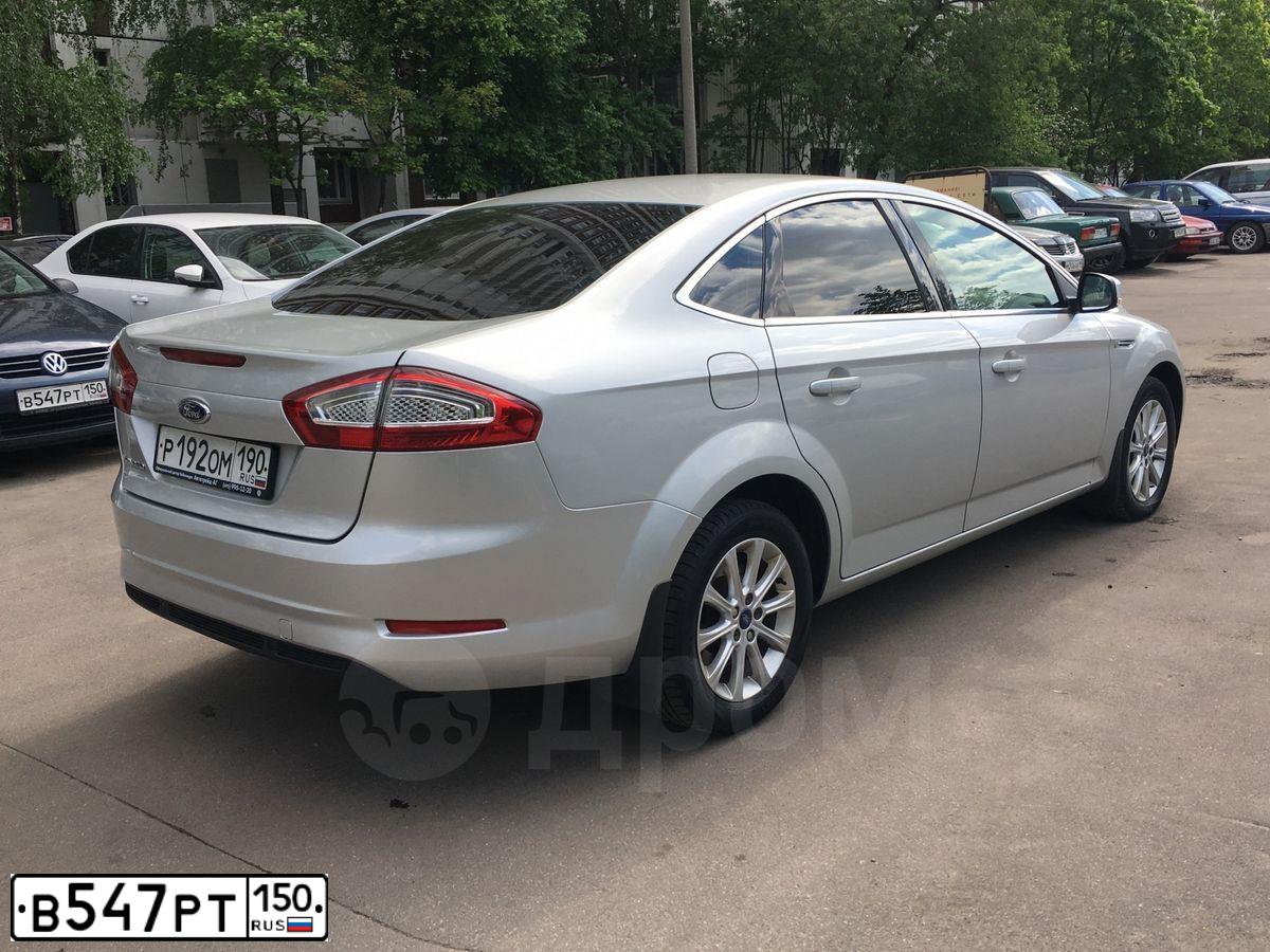 Фото автомобиля VOLKSWAGEN TOUAREG, 2019 — госномер В547РТ150. Цвет: Серый