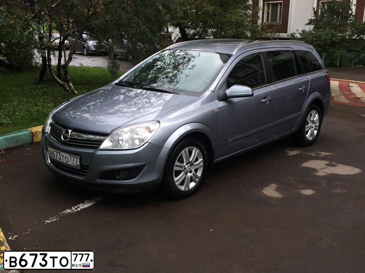 Фото автомобиля OPEL ASTRA, 2008 — госномер М722ОН01. Цвет: Серый