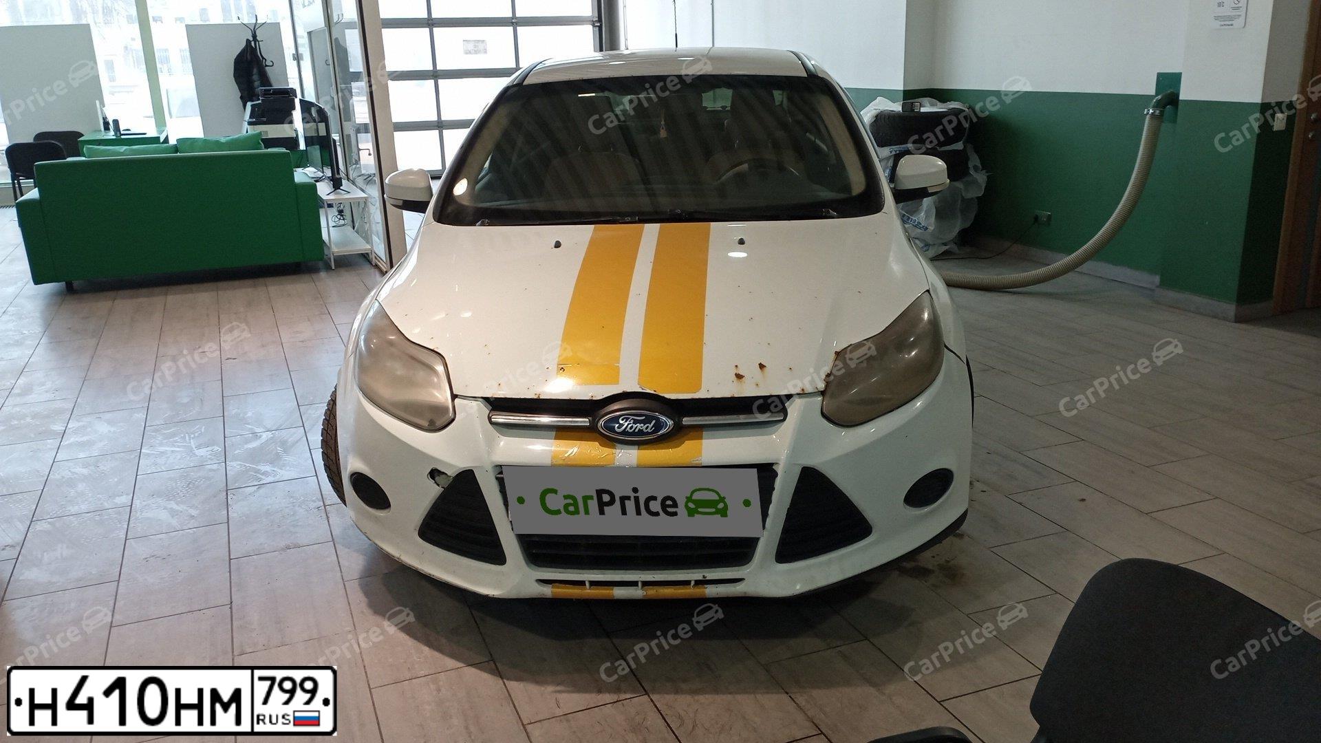 Фото автомобиля FORD FOCUS, 2014 — госномер В712ВС550. Цвет: Белый