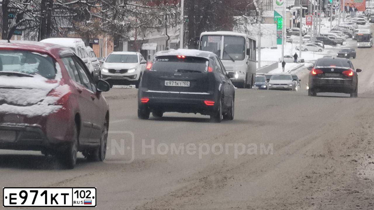 Фото автомобиля FORD FOCUS, 2007 — госномер Е971КТ102. Цвет: ЧЕРНЫЙ