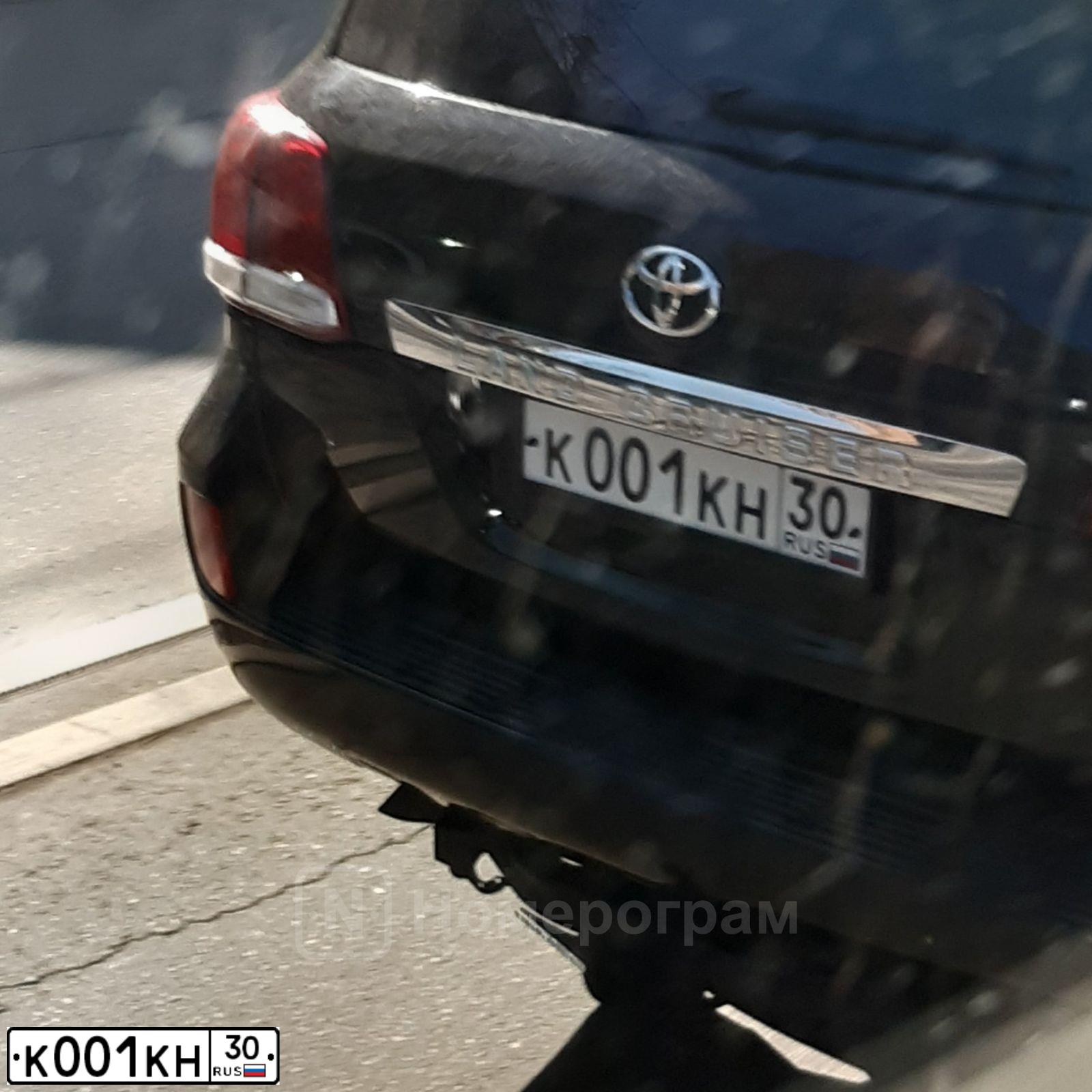 Фото автомобиля TOYOTA LANDCRUISER 200, 2010 — госномер К001КН30. Цвет: ЧЕРНЫЙ