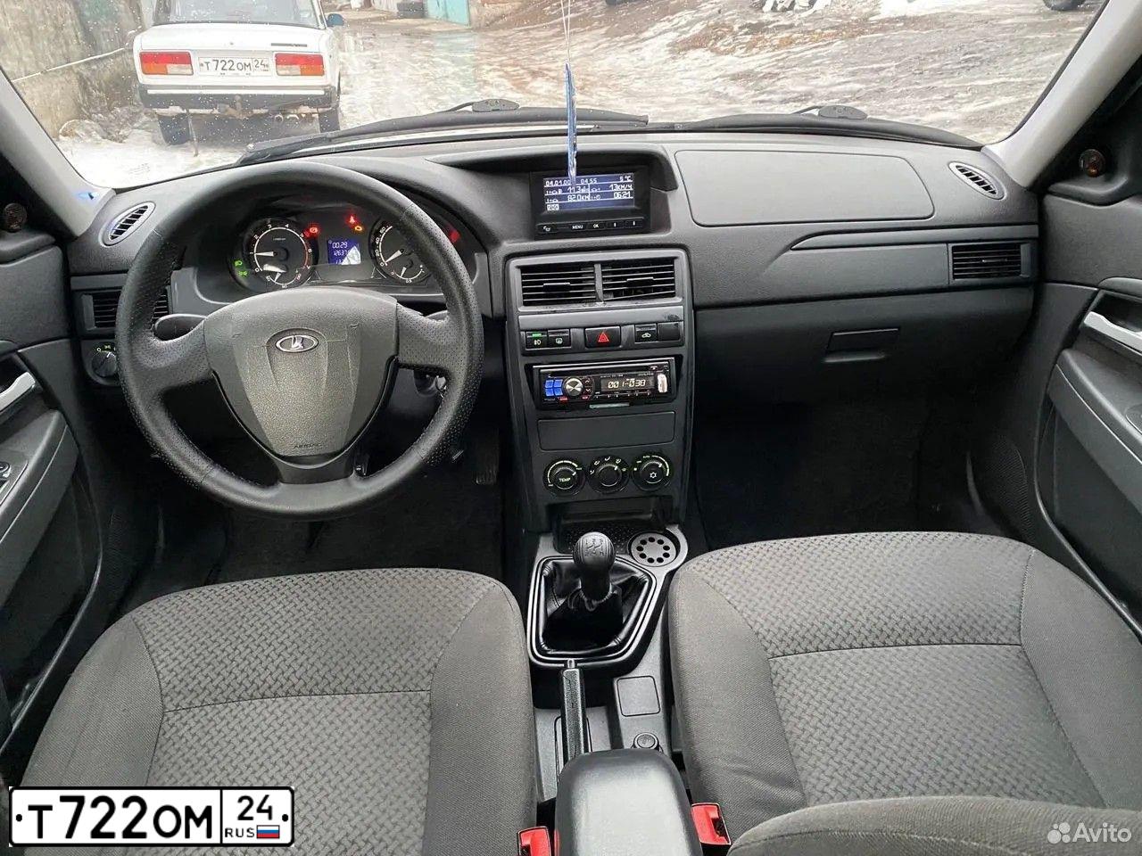 Фото автомобиля LADA 2107, 2004 — госномер А556ТС74. Цвет: ЯРКО-БЕЛЫЙ