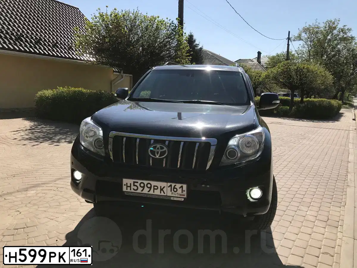 Фото автомобиля TOYOTA LANDCRUISER, 2012 — госномер Н599РК161. Цвет: ЧЕРНЫЙ
