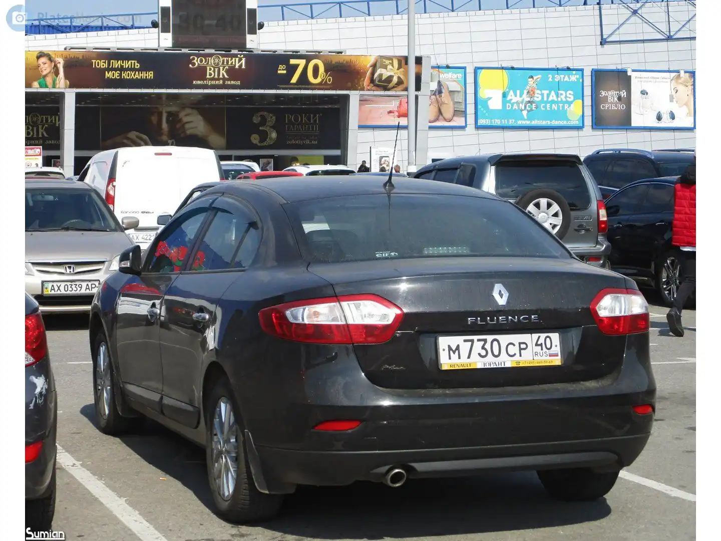 Фото автомобиля RENAULT FLUENCE, 2013 — госномер М820ЕМ761. Цвет: ЧЕРНЫЙ