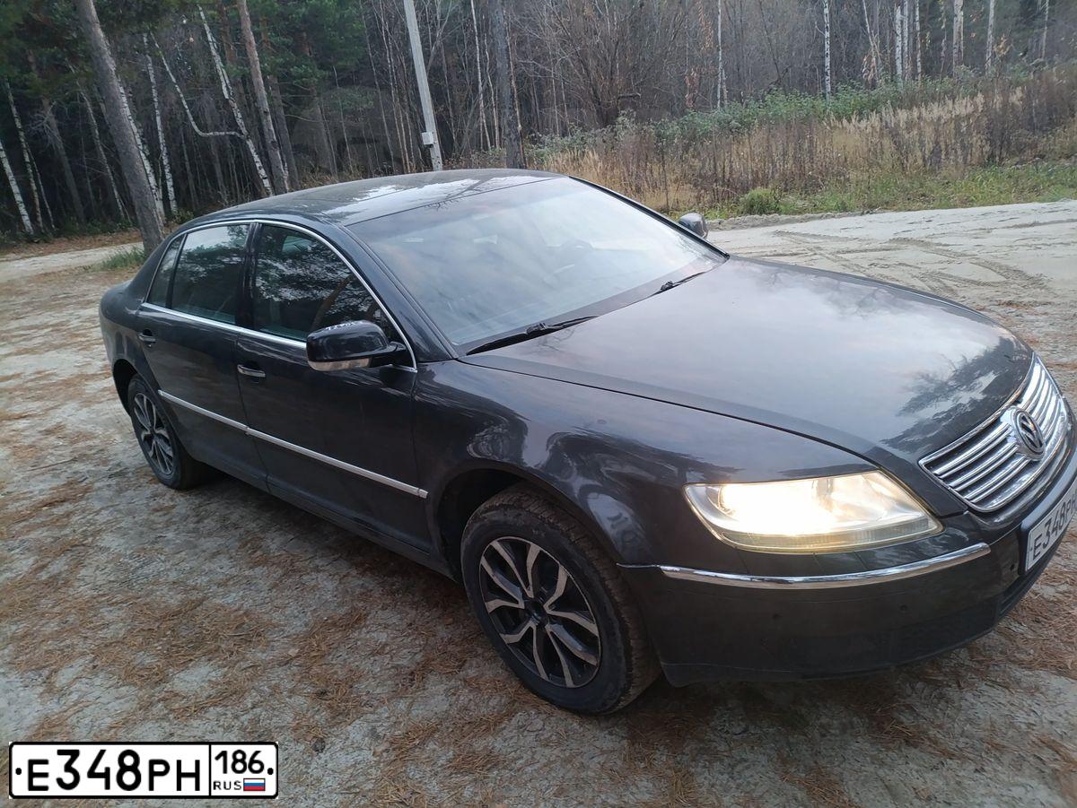 Фото автомобиля VOLKSWAGEN PHAETON, 2008 — госномер Е348РН186. Цвет: ЧЕРНЫЙ
