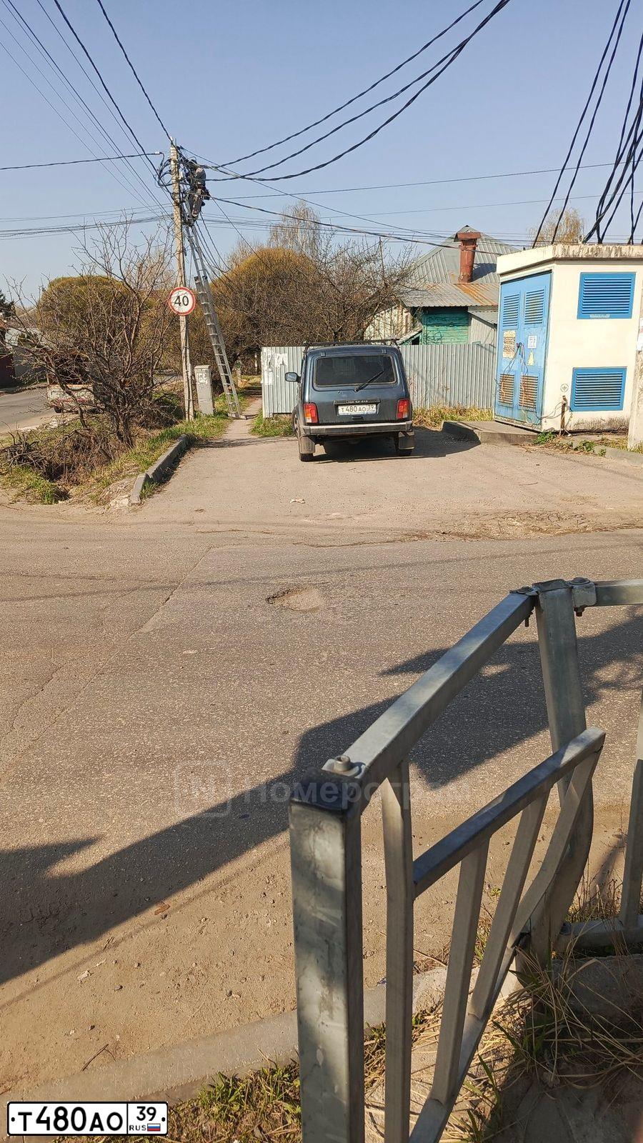 Фото автомобиля LADA 2131 NIVA, 2015 — госномер Т480АО39. Цвет: СЕРО-СИНИЙ
