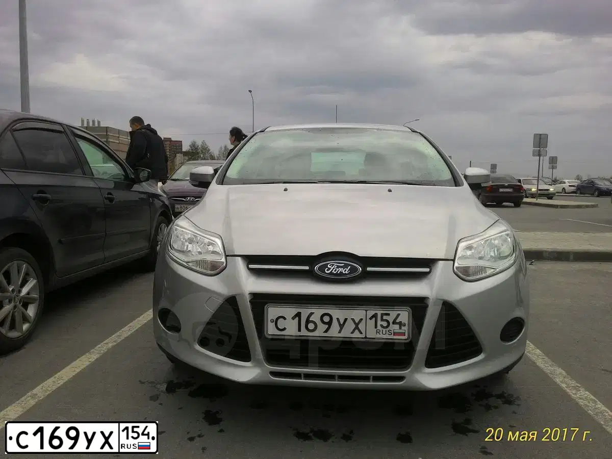 Фото автомобиля FORD D FOCUS, 2013 — госномер С169УХ154. Цвет: серебристый