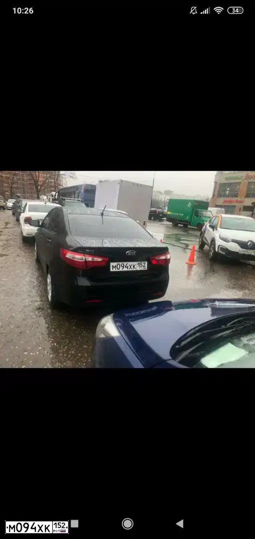 Фото автомобиля KIA RIO, 2013 — госномер М094ХК152. Цвет: ЧЕРНЫЙ