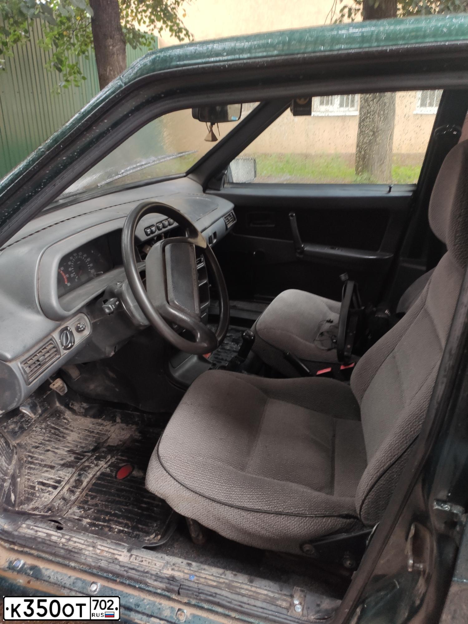 Фото автомобиля LADA 2114 SAMARA, 2004 — госномер Т077УМ12. Цвет: Темно-зеленый