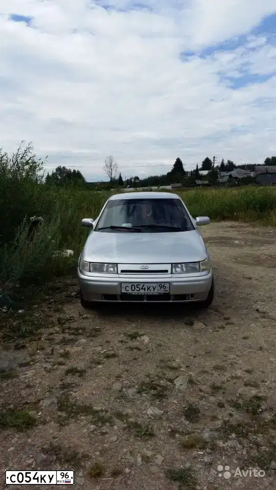 Фото автомобиля LADA 2112, 2003 — госномер С054КУ96. Цвет: СВЕТЛО-СЕРЫЙ