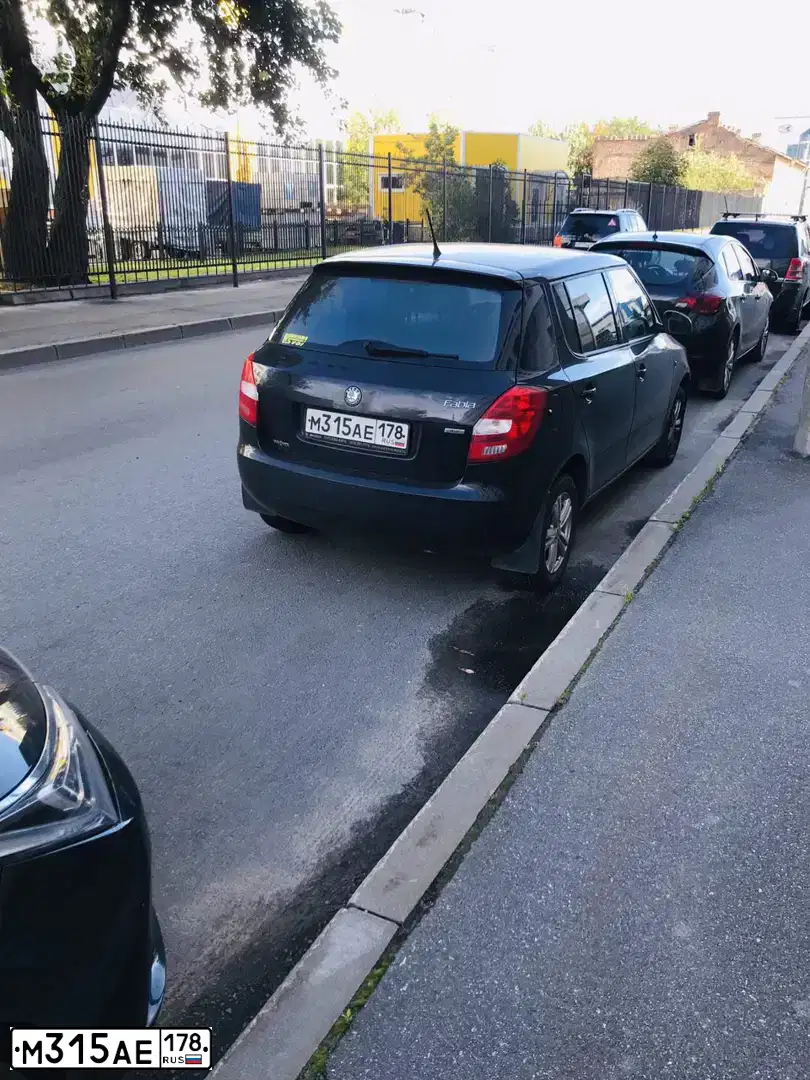 Фото автомобиля SKODA FABIA, 2011 — госномер М315АЕ178. Цвет: ЧЕРНЫЙ